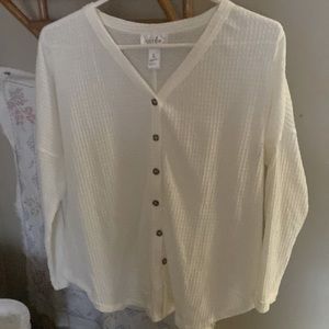 Womens long sleeved off white new never worn lite sweater button down size L